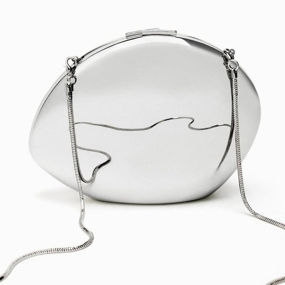 Zara Handbags - NWT  Oval Clutch in Silver Tone